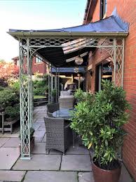 Based on the information provided by conservation wiki, a portico is a type of porch or roof that a typical metal roof overhang may be 2 to 4 inches, or even less. Metal Door Canopies Porches Verandas Bespoke Handcrafted