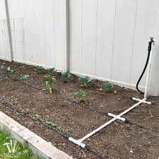 How To Install A Drip Watering System For The Garden A Houseful Of Handmade Garden Watering System Drip Watering System Garden Irrigation System