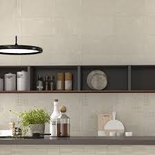 Cream cabinets give a kitchen a warm, inviting feel, and the shade is soft enough to complement many different colours. Build Cream Wall Tile Tileflair