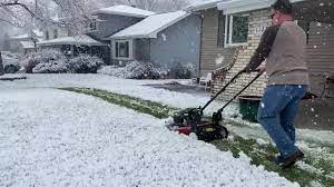 Another Beautiful Spring Day In Nebraska Man Mows Lawn As Snow Comes Down In Viral Video