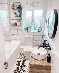If you want to embrace your bold side, go big with a statement chandelier. Small Bathroom With Big Tiles Novocom Top