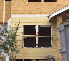 Before you wrap the house, make sure that there are no nails in the way, you don't want cut or damaged tyvek under the the hardie planks. 2 Bad Ways To Install Windows The Hard Way Energy Vanguard