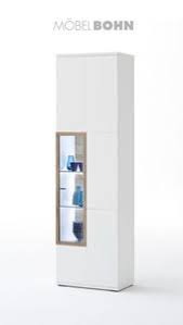 Vitrinenschrank Weisse Riviera Eichfarbene Kunststoffoberflachen Eine Tur Rechts In 2020 Vitrinenschrank Weiss Vitrine Vitrinenschrank