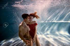 Entdecke rezepte, einrichtungsideen, stilinterpretationen und andere ideen zum ausprobieren. Underwater In The Pool With The Purest Water Loving Couple Hugging The Feeling Of Love And Closeness Soft Stock Photo Picture And Royalty Free Image Image 72200580