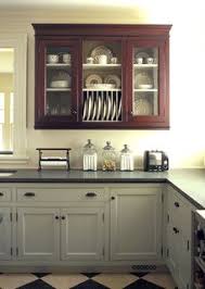 Mixing Stained Wood Kitchen Cabinetry With Painted Cabinets Home Decorating Des Contrasting Kitchen Cabinets New Kitchen Cabinets Cottage Kitchen Cabinets