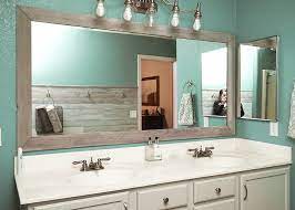 I found several examples of diy framed bathroom mirrors online that i liked, but the vast majority involved putting the frame over an existing. Diy Bathroom Mirror Frame For Under 10 Hello Hayley Blog