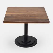 Instead of defaulting to a classic rectangular coffee table, think about how a square coffee table, round coffee table, or oblong coffee table might better complement your space. Restaurant Table Walnut Planks And Powder Coated Metal Base Rotsen Furniture