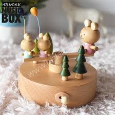 Hape e0332 rotating baby music box, spin & play the music, battery not needed, 40 x 40 cm cosmos gifts fine porcelain baby sleeping on stargazer lily flowers music box figurine (tune. Wooden Music Boxes Carousel Musical Box Gift Ideas Hizland Uk