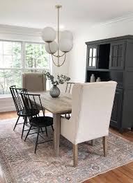 How To Update Your Rugs For Spring Cc And Mike Blog Cc Mike In 2020 Black Dining Room Linen Dining Chairs Black Dining Chairs