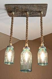 Creative Design Ideas For Exposed Pipes Diy Mason Jar Lights Jar Lights Mason Jar Chandelier