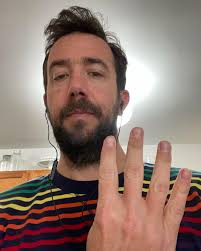 Happy New Year! I had to take a selfie of myself holding up four fingers to  verify my ID so I could get my CBD delivered because I am out. How's your