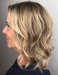 With a stylish hair style, reds can do well to create a younger look. 20 Best Hair Colors To Look Younger Instantly Cool Hair Color Youthful Hair Warm Blonde