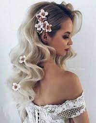 Weaving Hairstyles With Flowers Will Look More Perfect And More Individual Long Hair Styles Hair Styles Flowers In Hair
