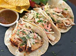 Add the flour, and baking powder, and whisk to make a thin batter. Easy Fish Tacos With Spicy Slaw Tasty Ever After