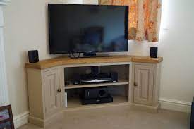 Consider a corner unit with storage cabinets or drawers to house entertainment devices, electronics, or consoles. 44 Corner Tv Stands Ideas In 2021 Corner Tv Stands Corner Tv Corner Tv Unit