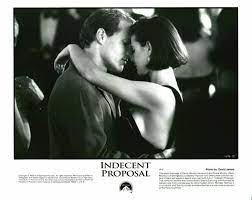 He offers a fat stack of cash to regular joe woody harrelson in return for one night with his wife (demi moore). Indecent Proposal The Husband Wife Indecent Proposal Romantic Movies Movie Covers