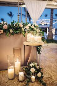 Candles Candles And More Candles Beautiful Candle Light For This Sweetheart Table Decor So R Sweetheart Table Wedding Gold Beach Wedding Beautiful Candles