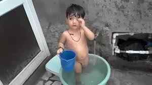 Little baby boy lying on the white towel with yellow rubber duck before baby boy under the towel after bathing at home. Little Cute Baby Boy Bathing Playing In Indian Video Dailymotion