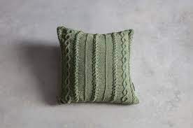 For an alternative, our geometric cushion covers and our check cushion covers are a fantastic way to add patterns to your sofa. Perch Parrow Annie Knitted Cushion In Pastel Sage