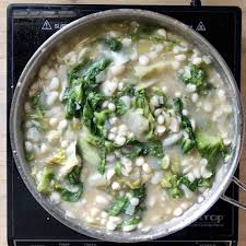 Place the beans in a large pot with water to cover by two inches. Escarole And White Bean Soup She Loves Biscotti