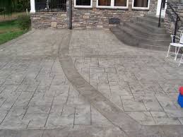 Ashlar patterns turn patios from ordinary into extraordinary. Stamped Concrete Patio Ashlar Slate With Roman Slate Borders Color Natural Charcoal Highl Decorative Concrete Patio Stamped Concrete Stamped Concrete Patio
