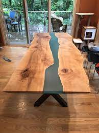 Ready made amazing river dining table with golden stainless steel legs ocean style live edge ambila wood clear epoxy resin table. Pin On Nautica Colections