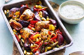 This moroccan couscous salad recipe in particular calls for roasted veggies (red bell pepper, eggplant, red onion, zucchini), chickpeas, grated carrots, parsley. Harissa Chicken Bake With Tzatziki Tesco Real Food Harissa Chicken Chicken Salad Recipe With Almonds Roast Dinner Recipes