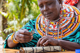 Tabitha, Head Beader at our Kenyan collaborator @lanatrzebinskicreations,  working