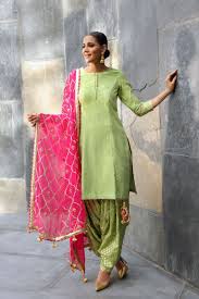 While the outfit looks best with a light grey suit and soft pink shirt, it can be tailored to suit your needs. Photo Of Light Green Patiala Suit With Hot Pink Dupatta Light Green Dress Indian Designer Outfits Indian Outfits