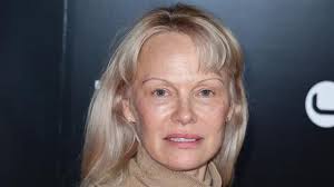 Pamela Anderson Unveils Red Hot Hair in Jaw-Dropping Transformation