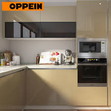 If your existing cabinets fit your space well enough and you just want to freshen up the look of your kitchen, don't rule out refinishing or refacing. China Oppein Modern Open Plan High Gloss Beige Kitchen Cabinets With Island China Open Kitchen Kitchen With Island