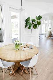 Tour The Cozy Elegant Home That Is Major Interior Goals The Everygirl Round Dining Room Round Dining Room Table Minimalist Dining Room