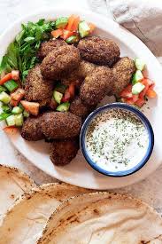 Kibbeh Is A Middle Eastern Dish Made Of Bulgur Ground Beef And Warm Spices Learn How To Make This Kibbeh Recipe Kibbeh Recipe Middle Eastern Recipes Recipes