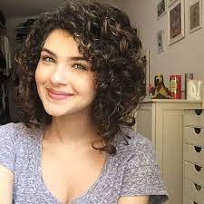 Adopting a layered and curly wavy look is the simplest way of attaining a messy look. Shoulder Length Haircuts For Thick Curly Hair Curly Hair Styles Naturally Medium Curly Hair Styles Curly Hair Styles