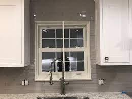 A discrete grout will define the shape of the tiles without being overpowering. Grout Color For Glass Tile Backsplash