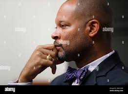 Nevada's incoming Attorney General Aaron Ford speaks with The Associated  Press, Friday, Dec. 14, 2018, in Las Vegas. Ford wants to find a way to  implement a stalled, voter-approved gun background check