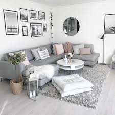With the living room painted with dark color walls gray sofa gives a cozy and modern look to the room. Modern White And Grey Living Room Contemporaryhomediy Living Room Decor Gray Living Room Grey Living Room Decor Apartment