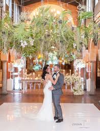 It all starts with the roots! Hanging Orchid Ceiling Orchid Roof Suspended Orchid Ceiling With White Orchid Mass Arrangements White Floral Hanging Orchid Hanging Flowers Wedding Orchids