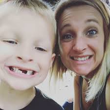 toothless kid's adorable grin