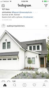 Metal roofs are a common choice, both in new construction and when an aging roof needs to be replaced. Metal Roof Accent Above Garage Doors Modern Garage Doors Garage Door Design Modern Farmhouse Exterior