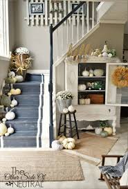And if you hang it much lower, you'll truncate the space. 28 Welcoming Fall Inspired Entryway Decorating Ideas