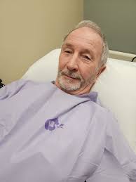 Labrador provides comfort after surgery and covid diagnosis