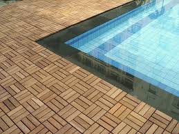Some tiles, such as the kontiki interlocking deck tiles provide a natural wood grain with a composite material. What Are Deck Tiles Deck Tiles Patio Outdoor Deck Tiles Interlocking Patio Tiles