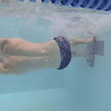 A turn in swimming in which one does a somersault just before reaching an. How To Flip Turn While Swimming Freestyle Howcast