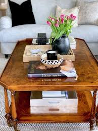 Whether you use it to display a collection, showcase your heirlooms, display a plant, or tie together all of the colors in your room, how you style a coffee table is important. Five Basic Steps To Style Your Coffee Table Classic Casual Home Simple Coffee Table Coffee Table Styling Coffee Table