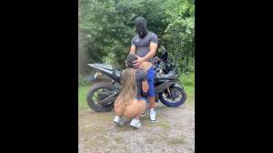 Couple makes sex in public forest on top of motorcycle.