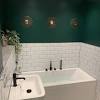 Find ideas on how to decorate a green bathroom and use shades of green as part of your bathroom decor. 3