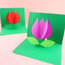 Make a few simple cuts into a piece of decorative paper to create a tab. How To Make A Pop Up Flower Card Easy Spring Tulip Craft For Kids I Heart Crafty Things