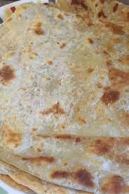 Roti Canai Paratha Indian Pancake Breakfast Lunch Tea Time And Dinner This Popular Indian Pancake Is Availab Indian Pancakes Roti Indian Food Recipes