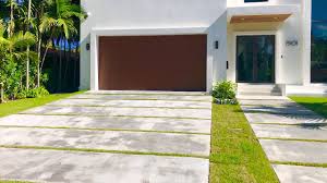 Lastly, wooden front garage doors develop a welcoming atmosphere. Custom Paving And More With Driveways By Design Youtube